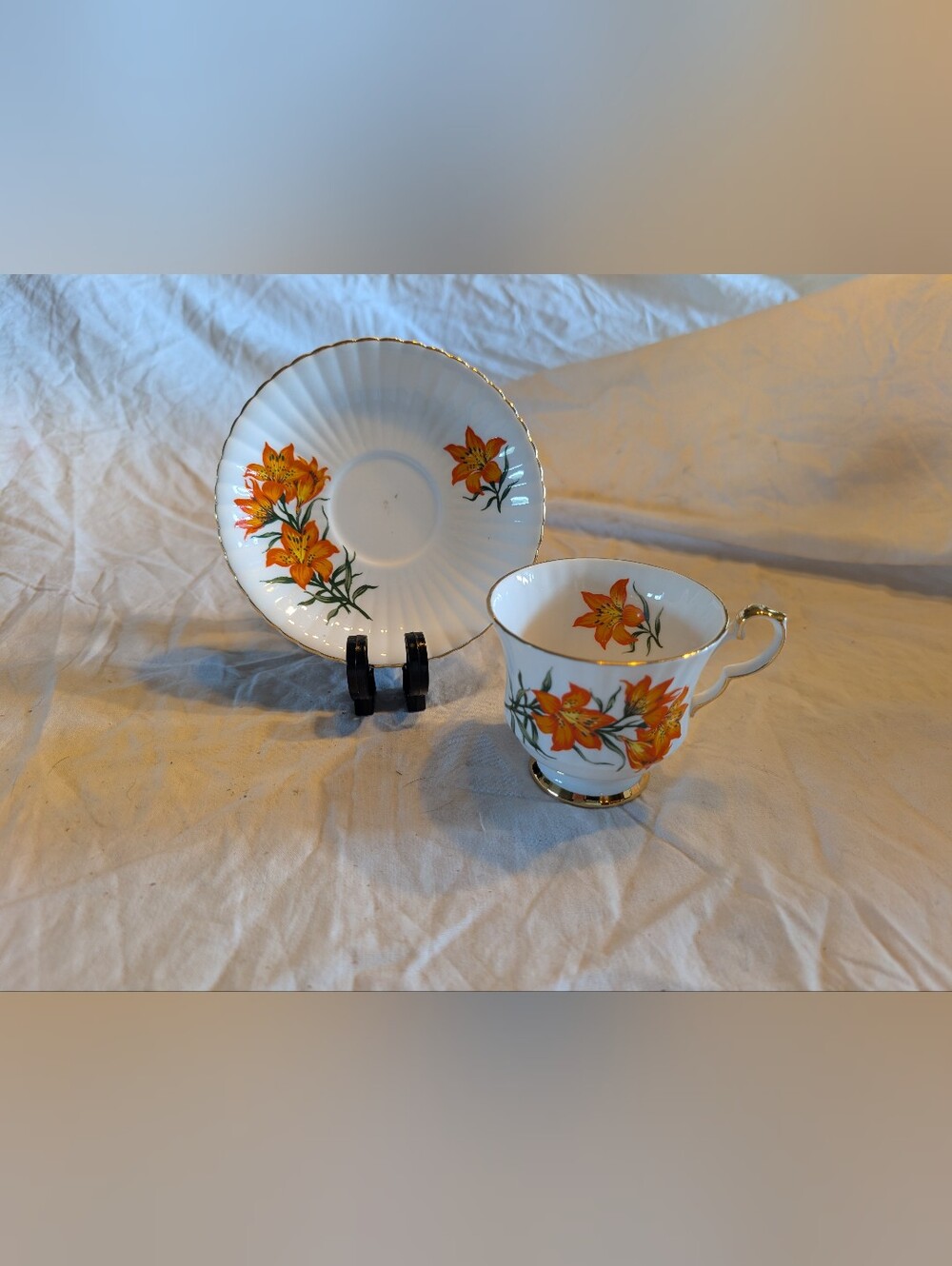 2/30$ Vintage Porcelain Teacup and Saucer Set with Orange Floral Design